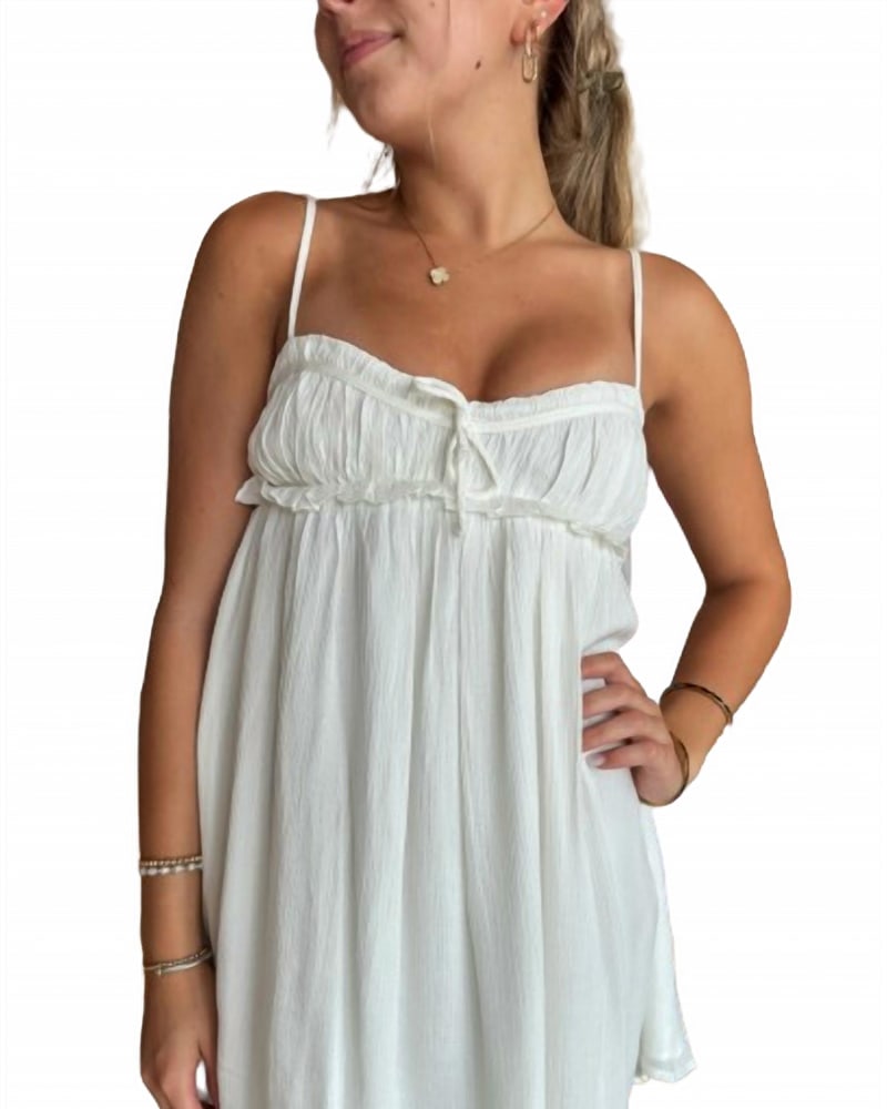 Front of a model wearing a size L Bella Mini Dress In White in White by Sky to Moon. | dia_product_style_image_id:346663